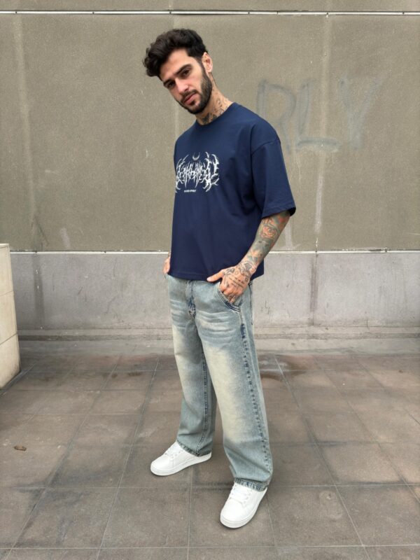 POLO BOXY FIT HUESOS